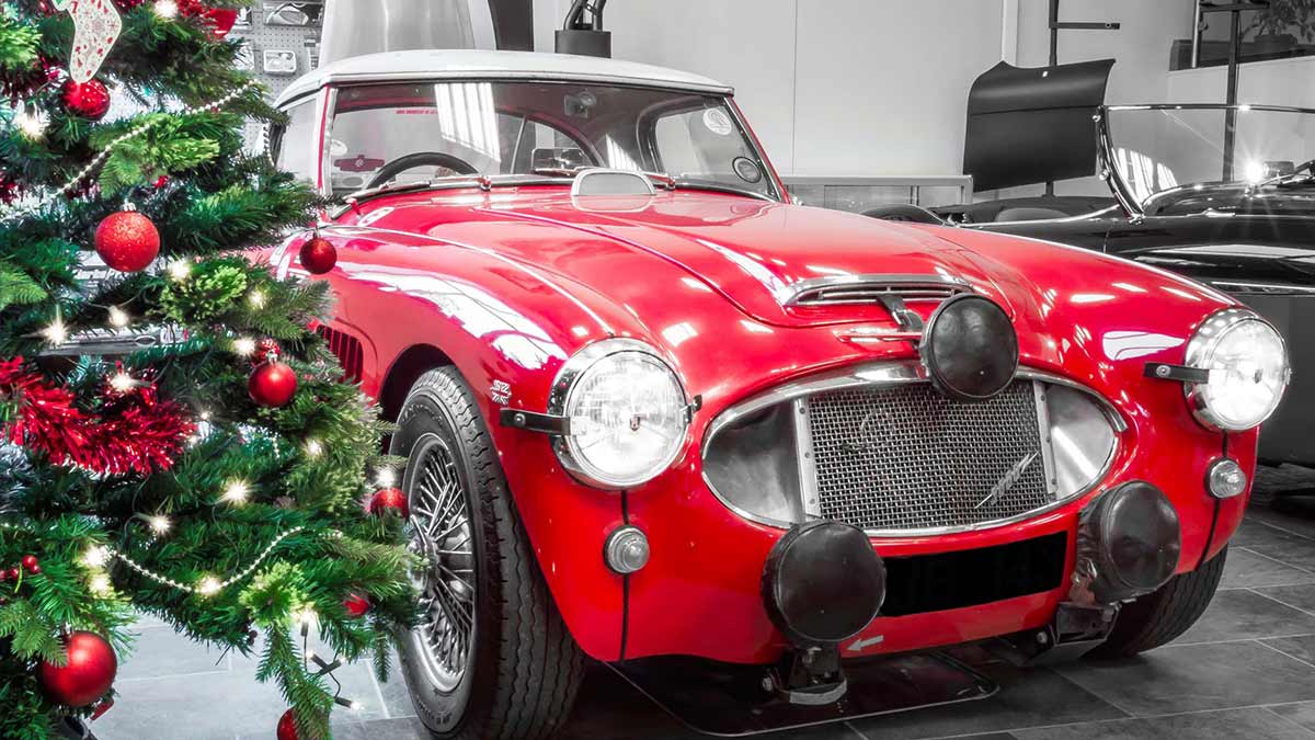 Austin-Healey 3000 rally spec next to a Christmas tree.