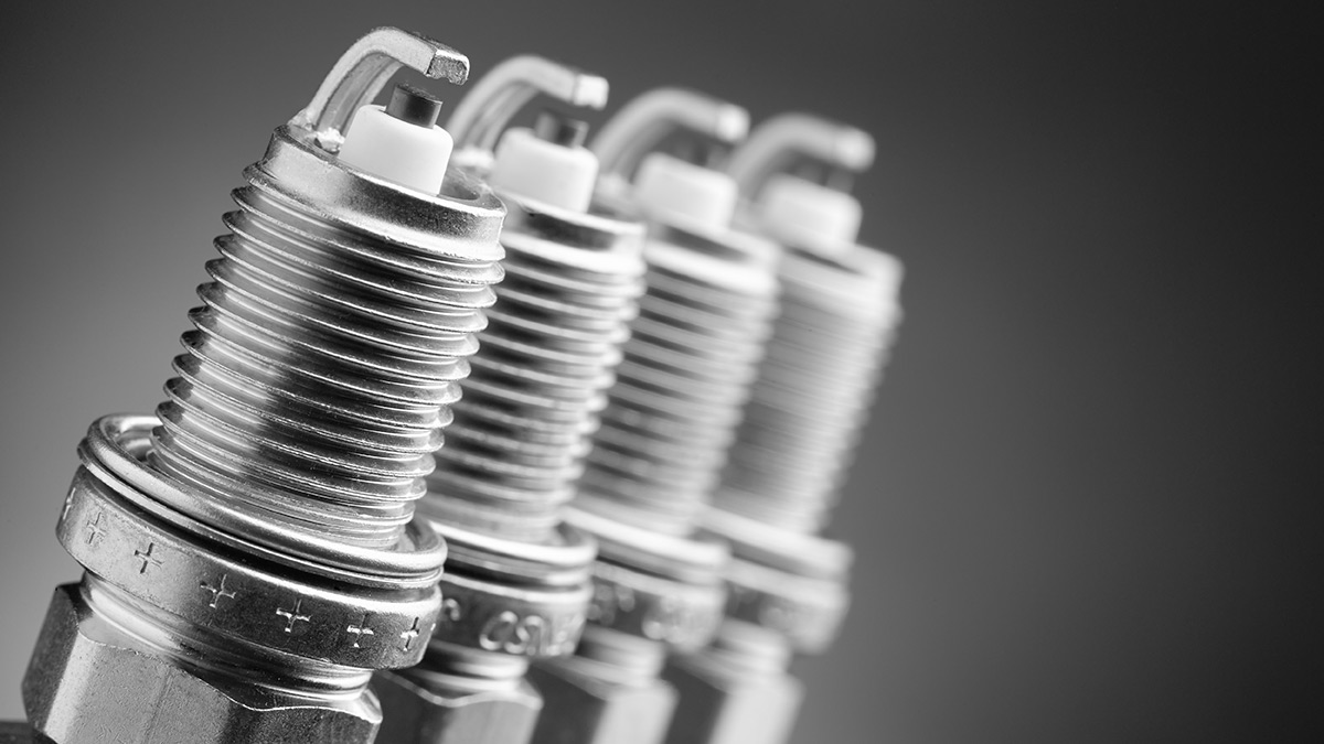 Group of 4 spark plugs