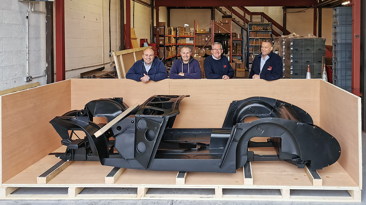 A H Spares Management team with complete Austin Healey BT7 centre-change inner body substructure in its custom made shipping crate.