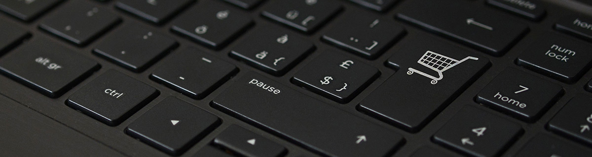 Black keyboard with shopping trolly icon.