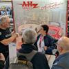 Patricia from A H Spares speaking with Austin Healey enthusiasts at the Époqu’Au