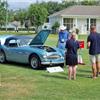 Rebecca Kemsley and John Lee speaking with Austin Healey club members at Conclav
