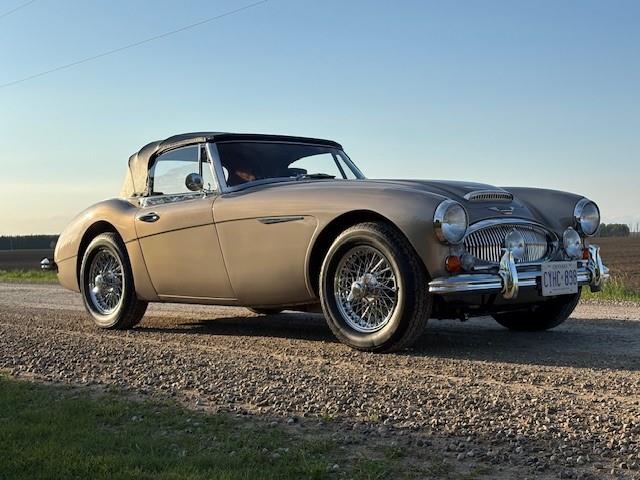 Side view of a 1967 Austin Healey 3000 MK3 BJ8 in Metallic Golden Beige