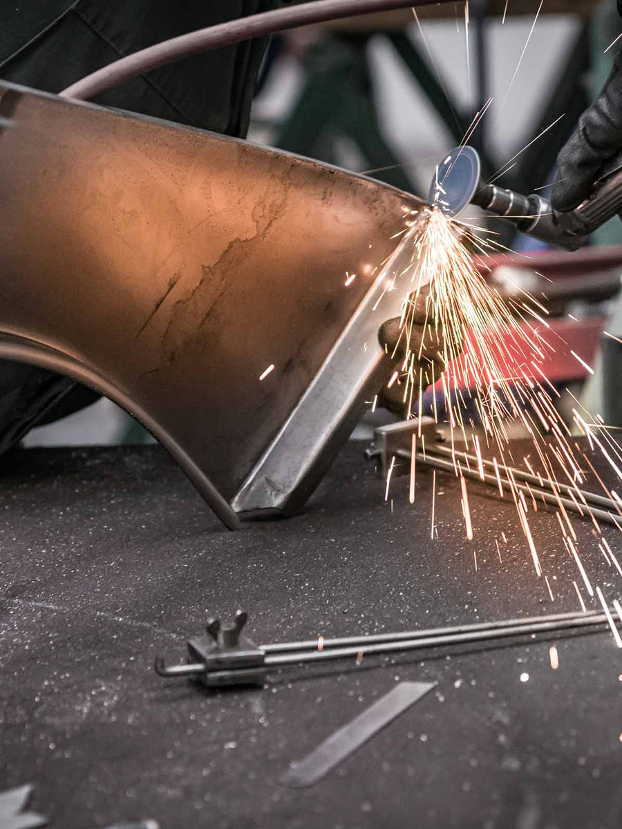 Grinding the edges of any Austin Healey wheel arch for perfect fit