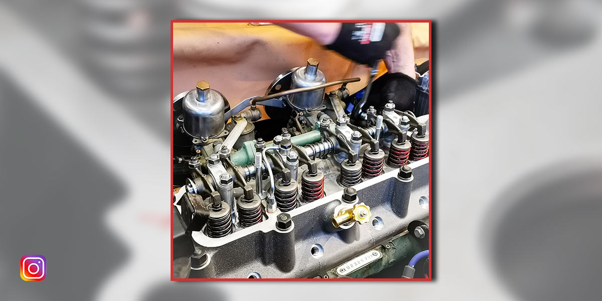 Installing alloy cylinder head on Austin-Healey 100/4 engine.