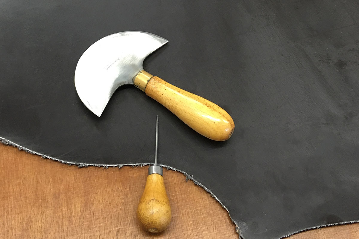 Sheet leather and leather working tools.