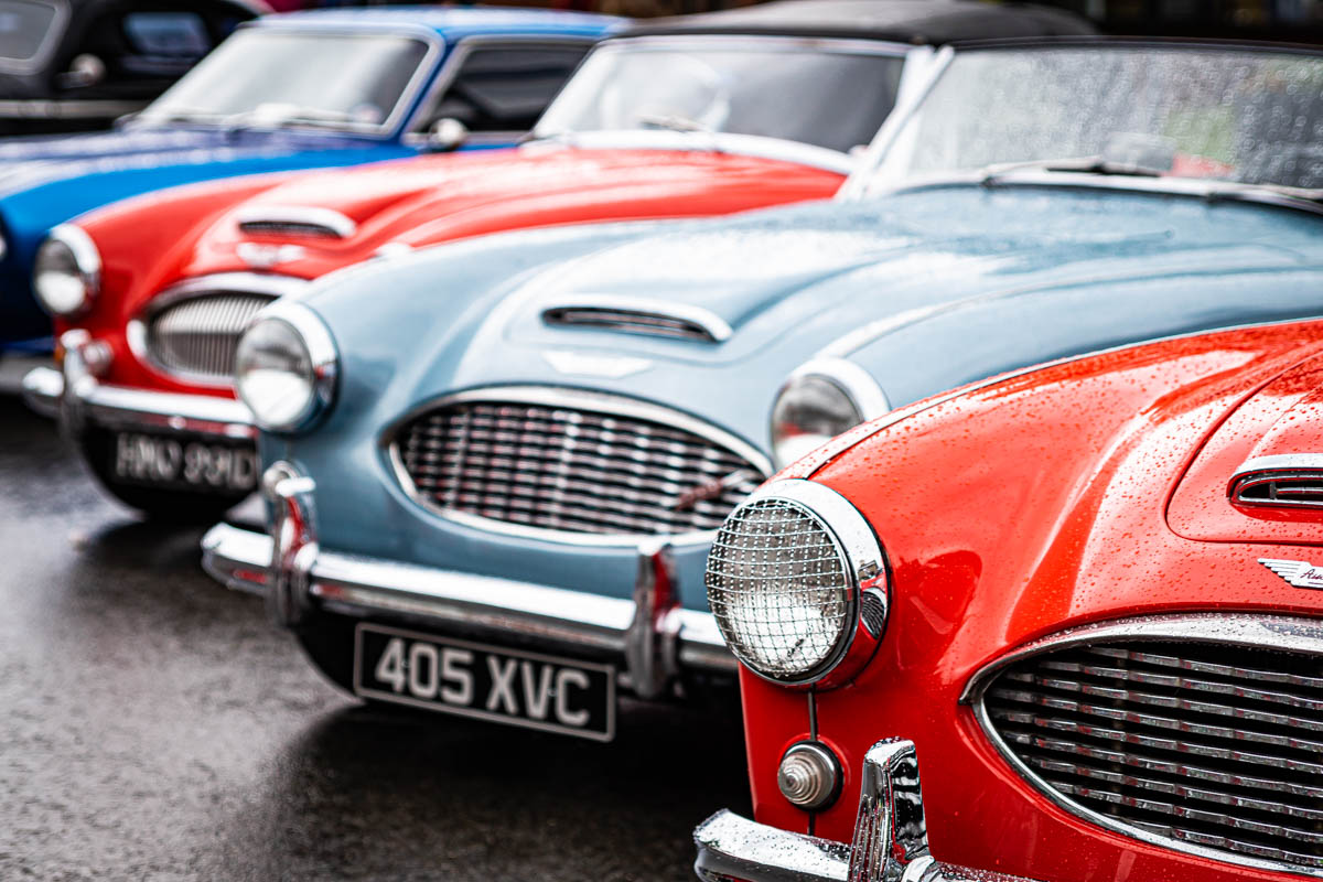 Green Austin Healey 100-Six parked on display at an Encounter event in the USA
