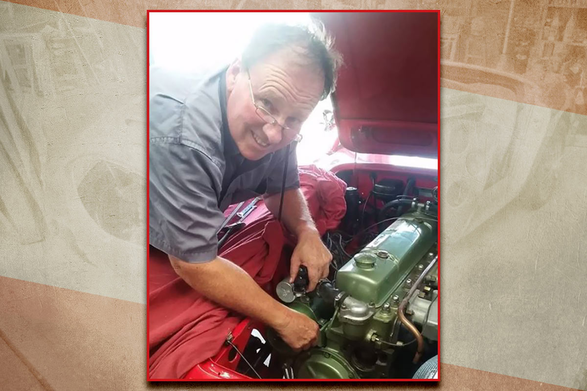 Greg Barnsley working on his Austin Healey 100/6 engine.