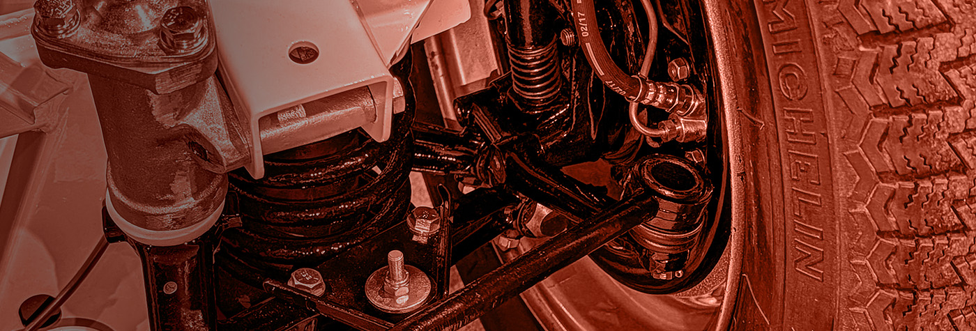 Austin Healey 100 front suspension showing wishbone and suspension bushes