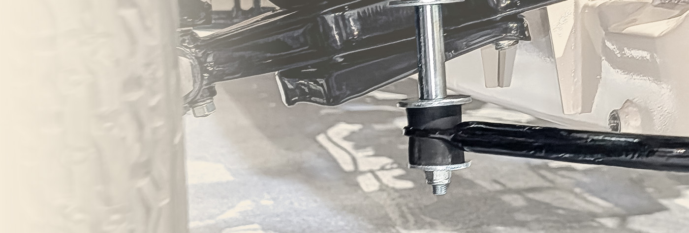 Austin Healey 100 front suspension showing wishbone and suspension bushes