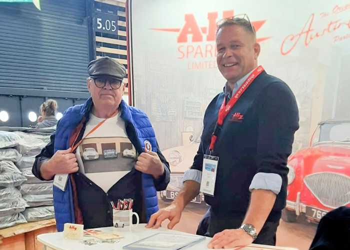 John from A H Spares chatting with a Healey fan at the Époqu’Auto Lyon 2025 event in France.