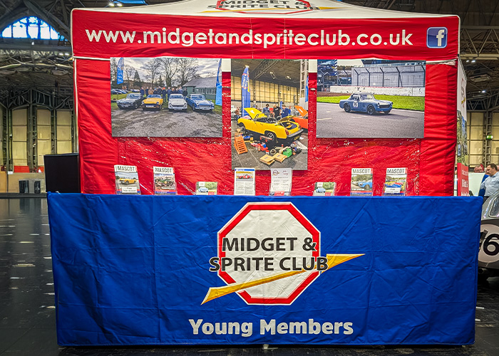 Midget and Sprite Club Young Members stand at the 2025 NEC Classic Motor Show promoting the next generation of classic car enthusiasts.