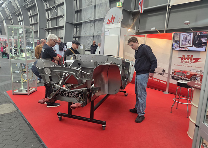 John and Paul from A H Spares speaking with visitors at Retro Classics Essen 2026.