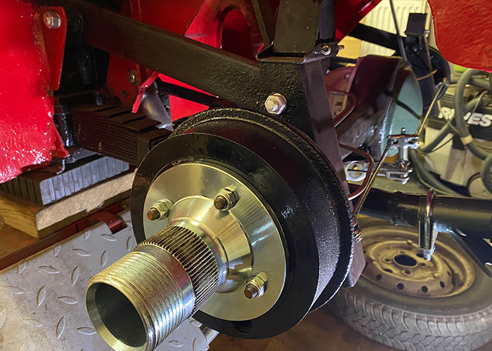 Refurbished rear hub and brake drum assembly fitted during Austin Healey Frogeye Sprite suspension rebuild.