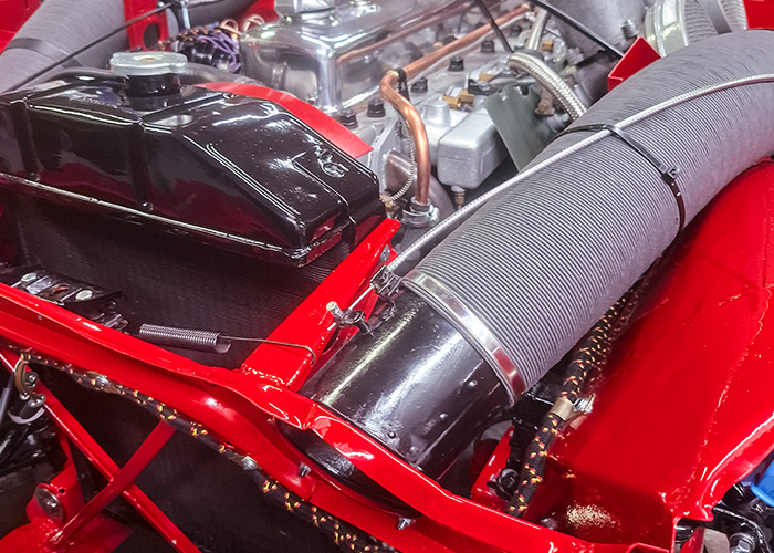Front air intake and radiator area of Bob Hill’s Austin-Healey BJ8 during preparation for paint at Cape Works