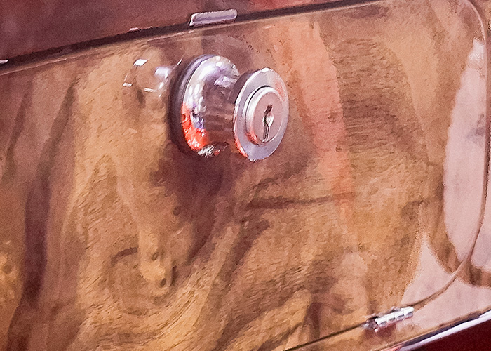 Austin-Healey BJ8 brightwork close-up showing chrome parts assessment during restoration at JME Healeys