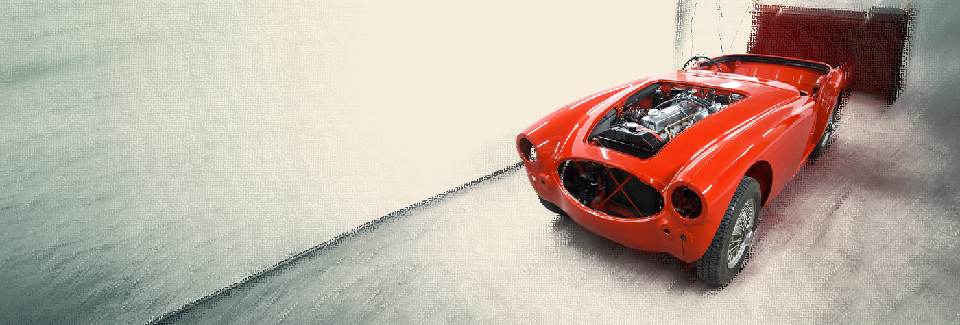 Freshly painted Austin-Healey BJ8 body shell at JME Healeys after colour and clear coat