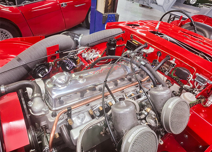 Open engine bay on Bob Hill’s Austin-Healey BJ8 during body fit checks before paint at JME Healeys