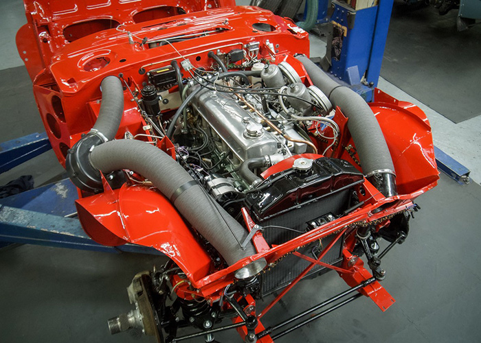 Austin Healey BJ8 engine installed and drivetrain fitted before outer body alignment