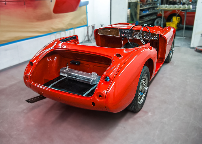 Rear three-quarter view of Bob Hill’s freshly painted Austin-Healey BJ8 at JME Healeys