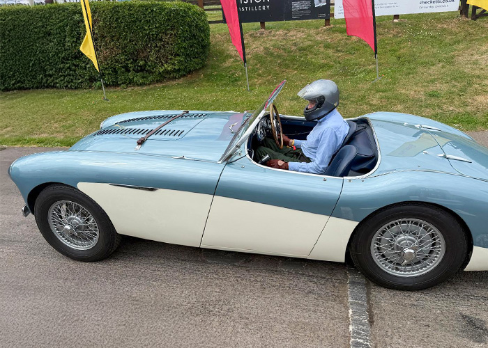 Blue and white Austin Healey 100M preparing for the Hillclimb challenge
