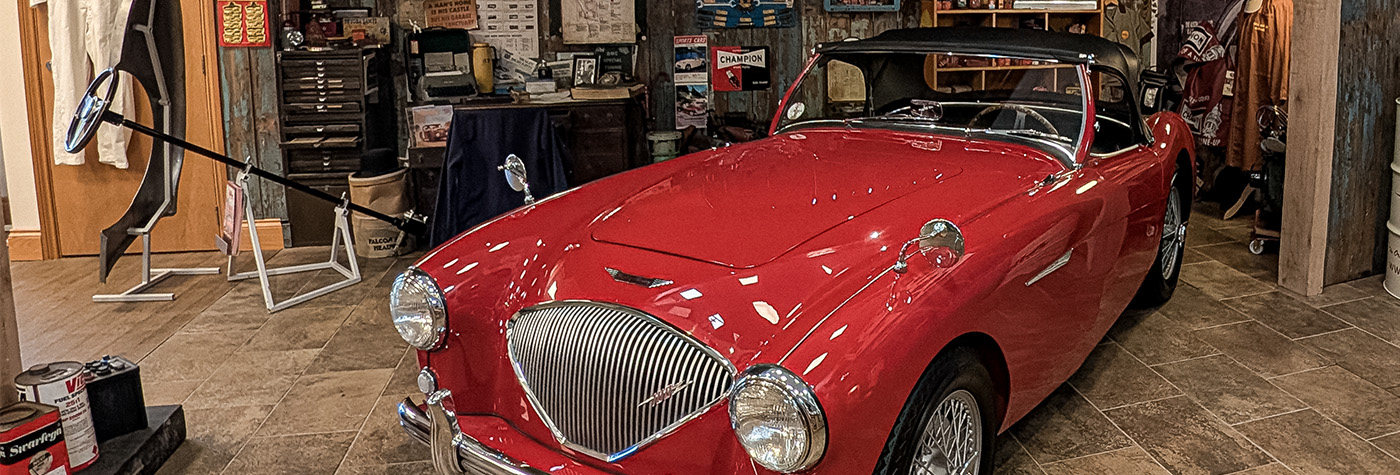 A H Spares showroom with Austin Healey BN1 on display in the UK