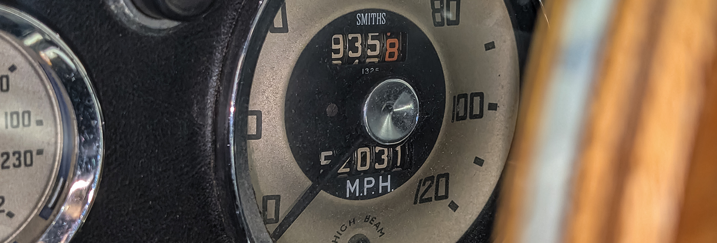 Austin Healey 3000 cockpit showing original wooden steering wheel and Smiths gauges