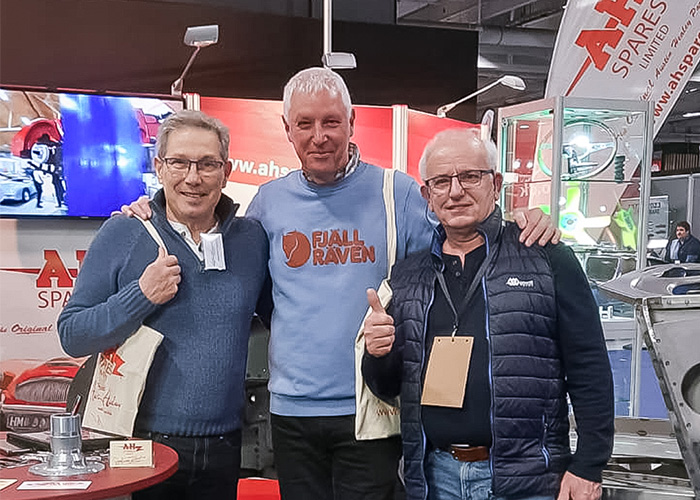 Long-standing A H Spares customers visiting the Austin Healey stand at Rétromobile 2026 in Paris.