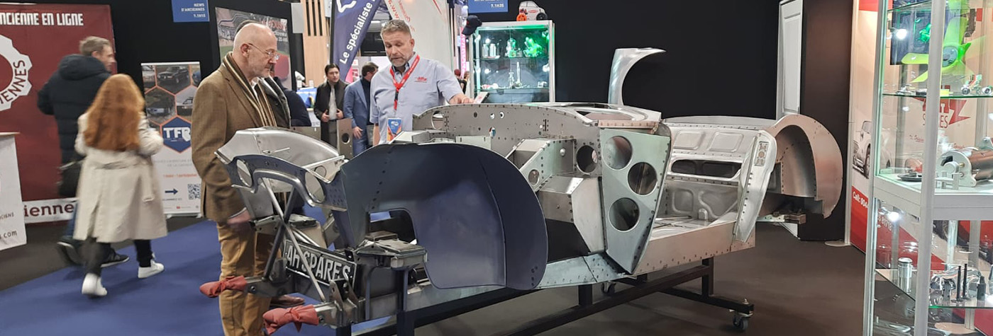 A H Spares exhibition stand at Rétromobile 2026 featuring the Austin Healey BT7 inner bodyshell assembly in Hall 7.1.