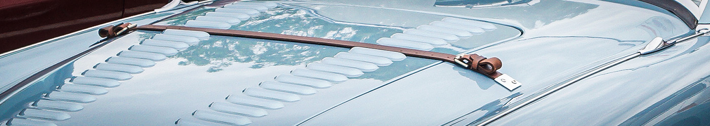 Austin Healey 100M louvered aluminium bonnet with leather securing strap and chrome fittings, representing Le Mans bodywork specification.