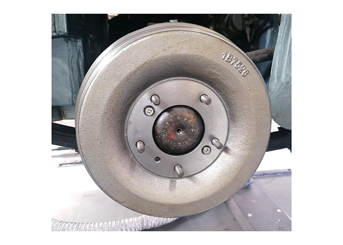 Rear brake drum attached to an Austin Healey rear axle