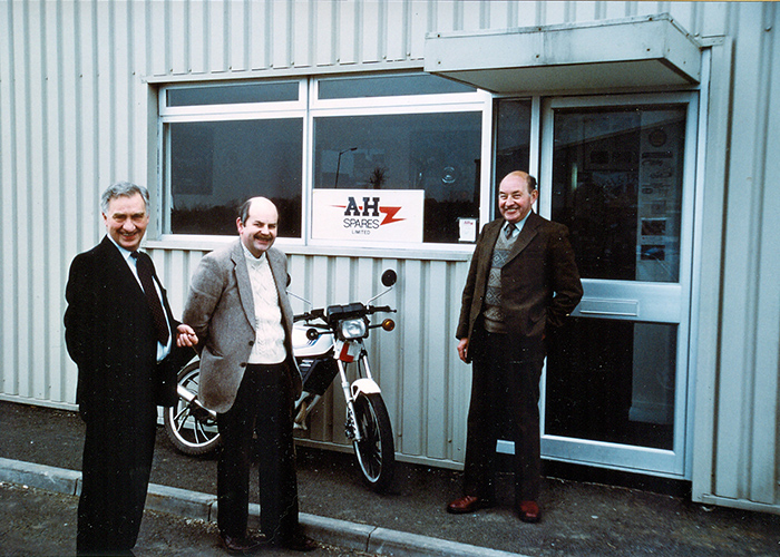 Roger Moment, Bob Hill, and Fred Draper outside A H Spares