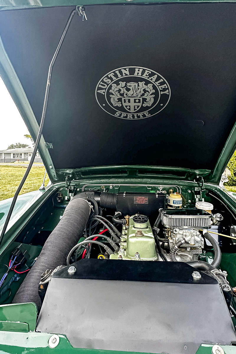 Restored engine bay beneath the open bonnet of Cari Kalapis' 1969 Austin Healey Sprite MkIV