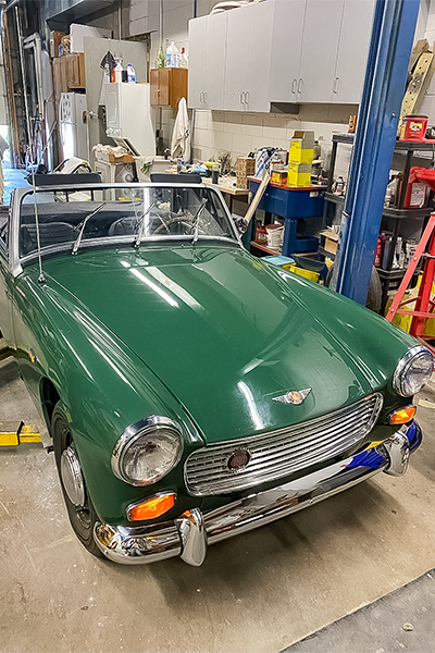 Cari Kalapis' restored British Racing Green Austin Healey Sprite nearing completion in August 2025