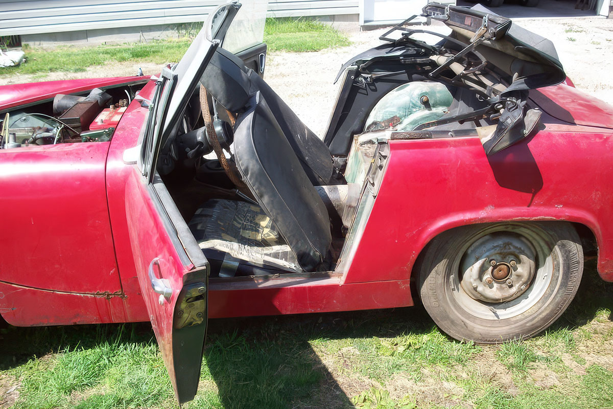 Cari Kalapis' red 1969 Austin Healey Sprite MkIV coming out of long-term storage around 2014