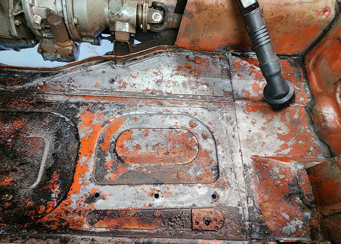 Austin Healey 3000 floor stripped to bare metal during restoration