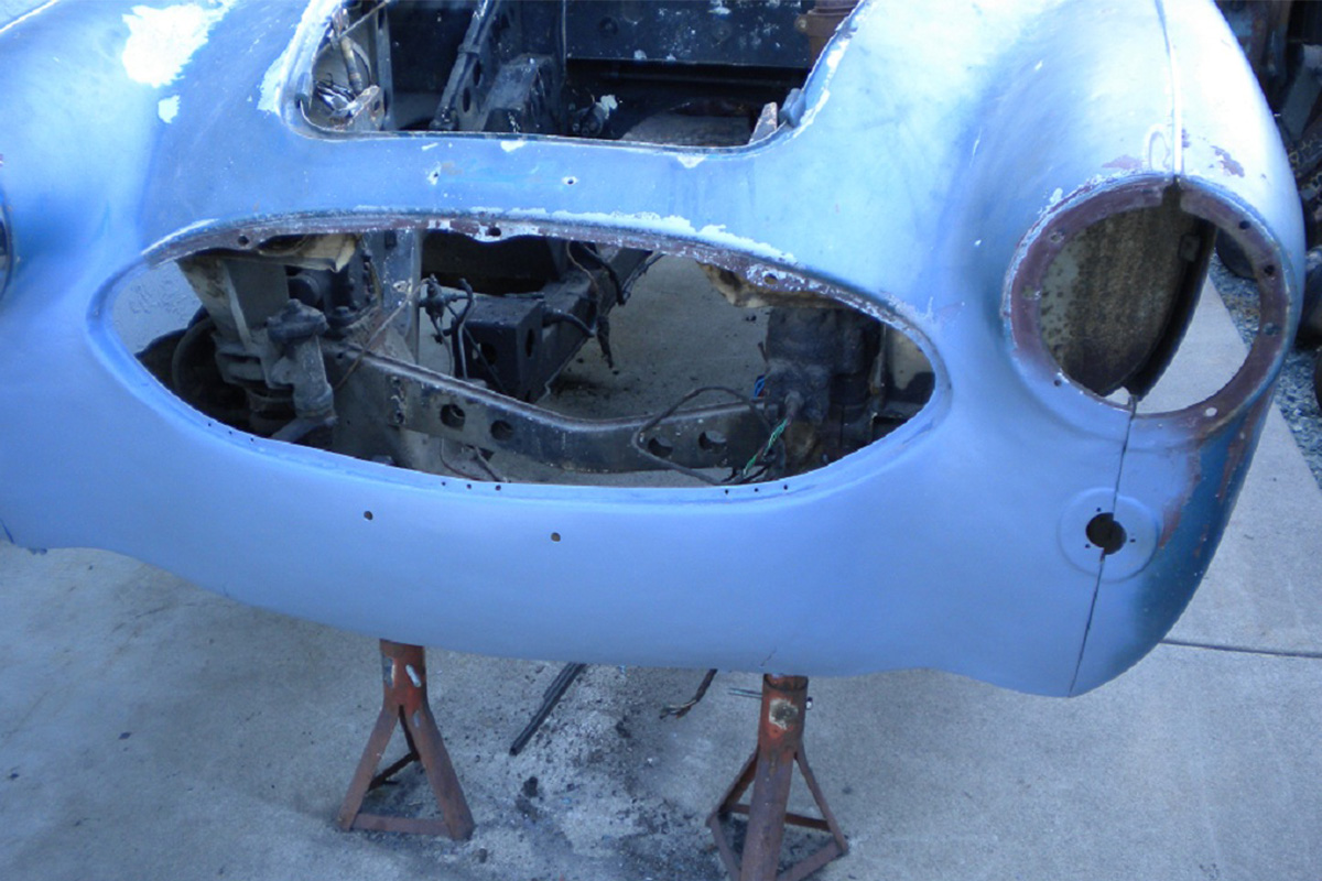 Front suspension and steering fitted to the painted Austin Healey 3000 chassis