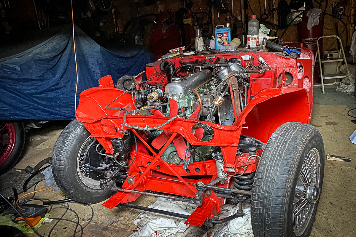 Austin Healey 3000 chassis and running gear during assembly in Peter Hunt's garage