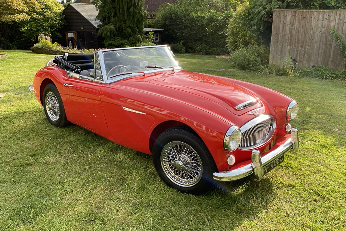 Peter Hunt's restored Austin Healey 3000 completed and parked on grass